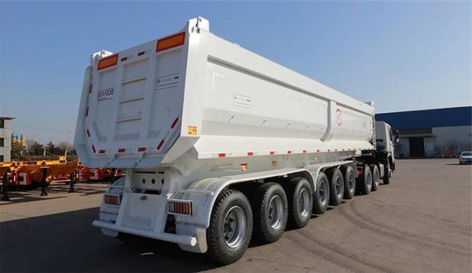 Main Specification: Overall dimension:	11000*2500*4000mm Volume:	80-100T Axles:	6 axles Suspension:	Heavy duty mechanical suspension Tipping system:	196 hydraulic cylinder Tire	24 units King pin	90# Landing gear	JOST Brake system	WABCO Electrical system	24V, LED lights   Advantages of TITAN dump trailer for sale: 1. Hydraulic cylinder: The heavy-duty cylinder with a wider diameter, stronger lifting capacity and higher height, which makes the lifting more stable and does not easy to roll over. 2. .Vice beam: with 4 units vice beam, which can make the bottom of the box better bearing capacity, and will not easily deform. The lattice structure of the side door makes the side door more solid. 3. Double-plate main beam for heavy-duty dump trailer. For heavy-duty dump semi-trailers, the main beam is designed with double plates, which have stronger carrying capacity